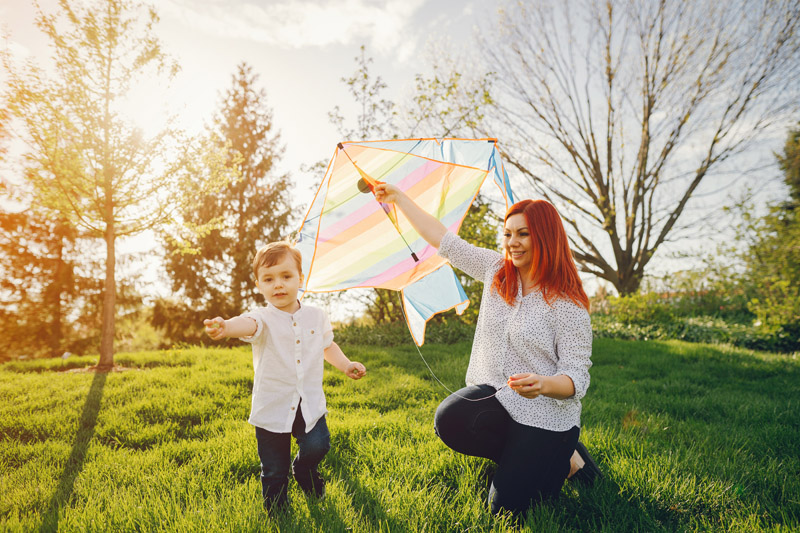 cute-family-in-a-sunny-park-3V7Q6XF.jpg